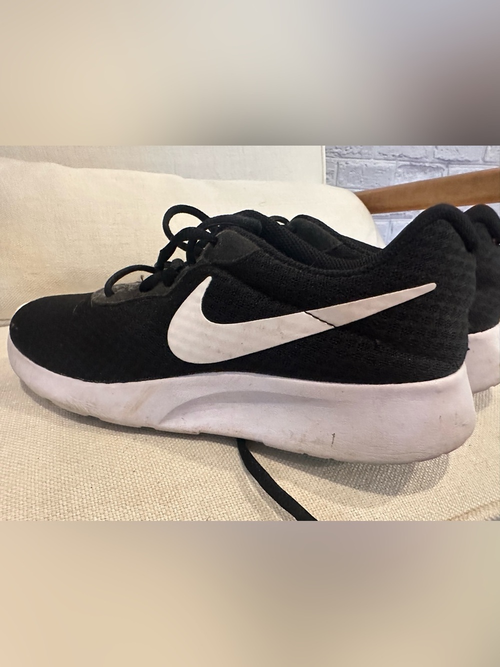Nike Black sneaker with White Swoosh